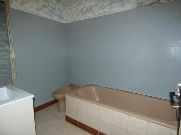 MaisonT4 d'environ 85m² avec cour de 25m² en plein coeur du village