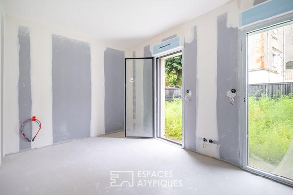 Appartement en rez-de-jardin en plein centre ville