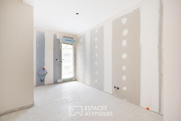 Appartement en rez-de-jardin en plein centre ville