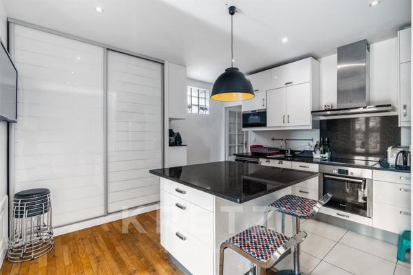 Appartement avec terrasse et vue Seine au cœur du 16è