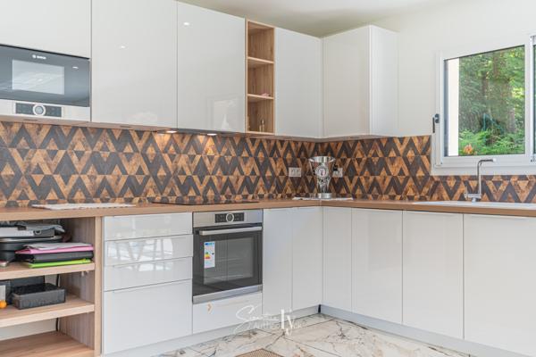 Maison
         4 pièces
        - 105 m²