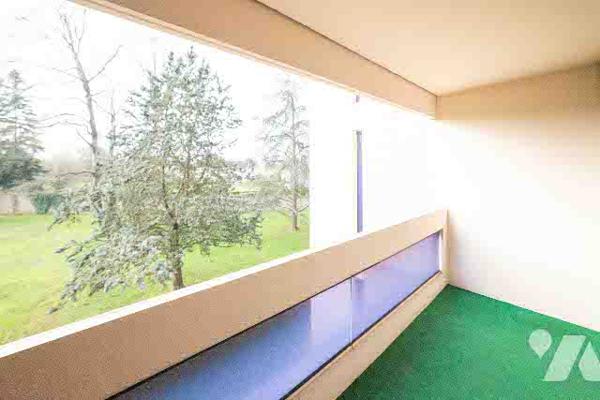 T3 traversant 1er étage, ascenseur, cave et garage