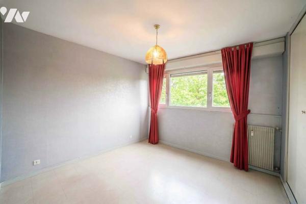 T3 traversant 1er étage, ascenseur, cave et garage