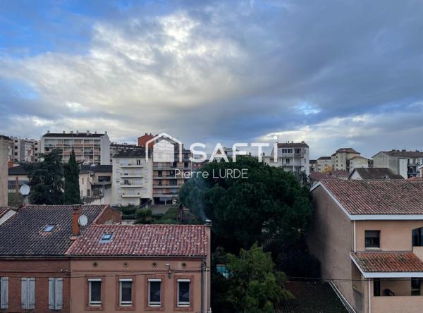 Appartement T5 rénové avec balcons et stationnement