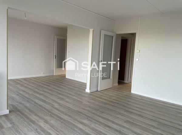 Appartement T5 rénové avec balcons et stationnement