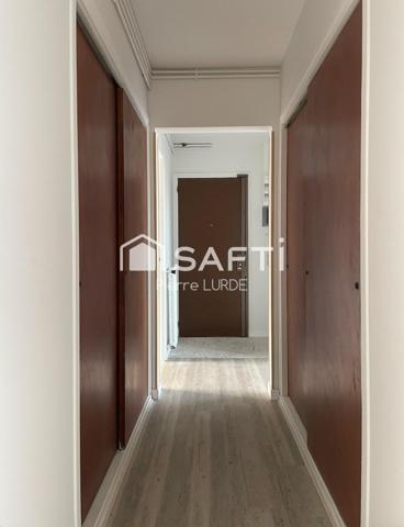 Appartement T5 rénové avec balcons et stationnement