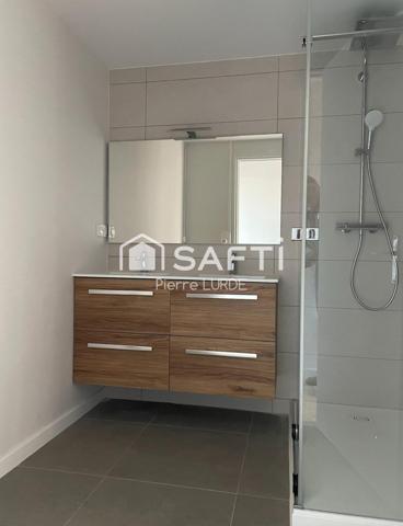 Appartement T5 rénové avec balcons et stationnement