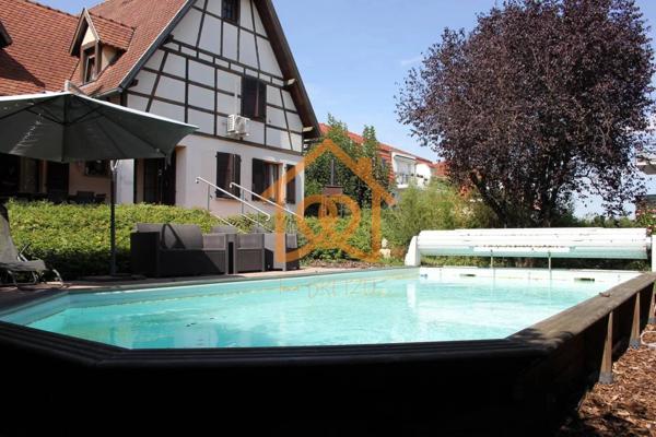 En exclusivité Jolie Maison de 150m² au sol à HOLTZHEIM avec piscine chauffée, climatisation sur 7 ares de terrain
