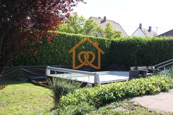 En exclusivité Jolie Maison de 150m² au sol à HOLTZHEIM avec piscine chauffée, climatisation sur 7 ares de terrain