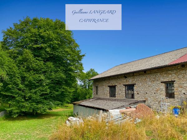 OYONNAX (01100) - PROPRIÉTÉ COMPRENANT PLUSIEURS BÂTIMENTS - 6720 m2 DE TERRAIN