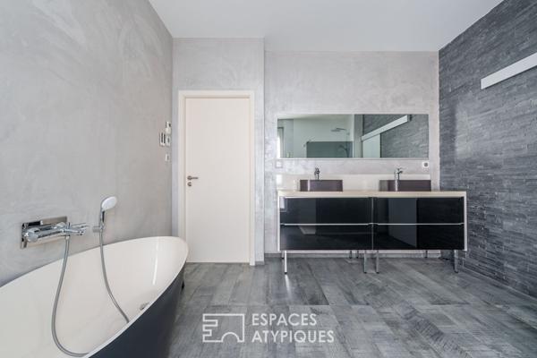 Triplex avec jardin dans une ancienne école