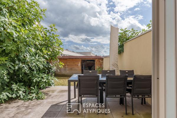 Triplex avec jardin dans une ancienne école