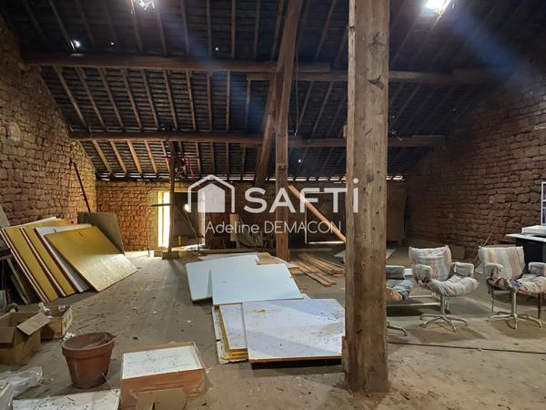 Bâtisse à rénover avec garages