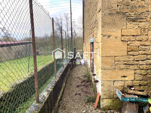 Bâtisse à rénover avec garages