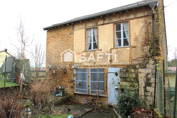 Bâtisse à rénover avec garages