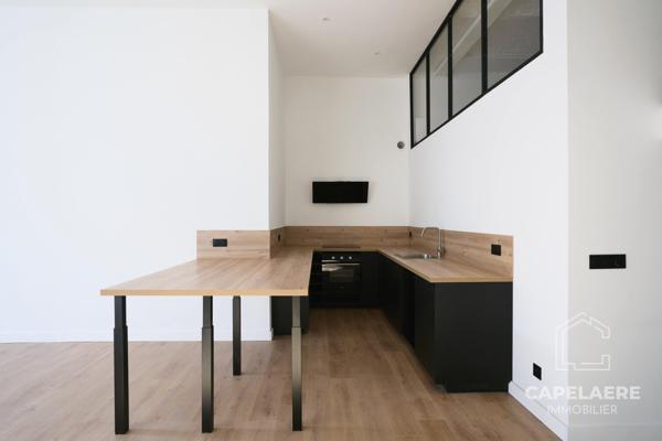 Tourcoing (59200) Loft 120 m2, 4 pièces, balcon et stationnement