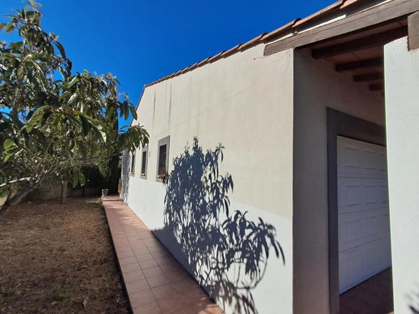 VILLEMOUSTAUSSOU – ÉLÉGANTE MAISON FAMILIALE AVEC JARDIN, TERRASSE ET GARAGE