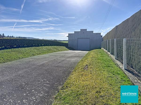 A Cottance, 10 minutes de Feurs, Local d'activité / dépôt de 207 m2 au sol sur terrain constructible de 1635 m2