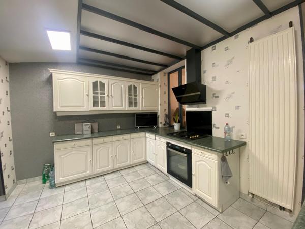 MAISON DE VILLE AVEC JARDIN