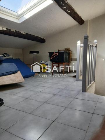 "Maison de village cosy sur 4 niveaux avec garage"