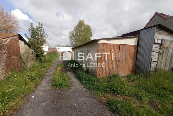 Investisseur/// Terrain avec 6 Box/garages