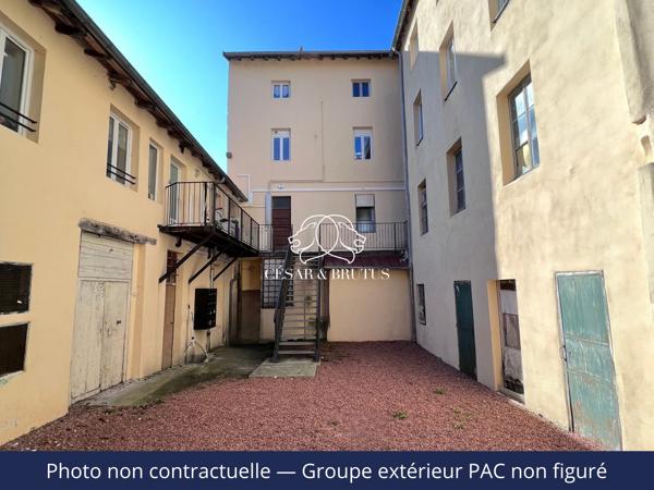 Immeuble de 758 m2 : 7 appartements, 3 locaux commerciaux, cour intérieure et caves