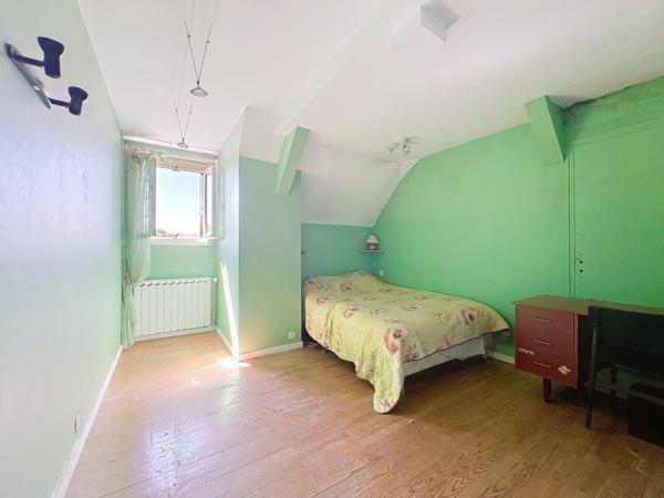 Grande maison familiale et ancien commerce