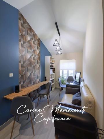 Maison de caractère de 226 m2, DPE B, 4 suites parentales, 2 garages, grande cave aménageable.