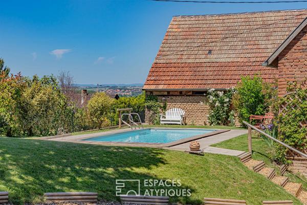 Propriété alsacienne réinterprétée avec piscine et vue