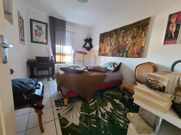 Appartement de type T3 d'une superficie de 71 m2.