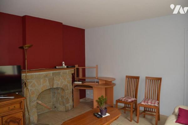 MAISON DE VILLE AVEC JARDIN ET GARAGE SITUEE SUR SECLIN