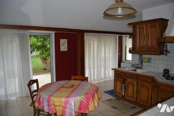 MAISON DE VILLE AVEC JARDIN ET GARAGE SITUEE SUR SECLIN