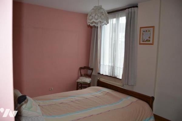 MAISON DE VILLE AVEC JARDIN ET GARAGE SITUEE SUR SECLIN