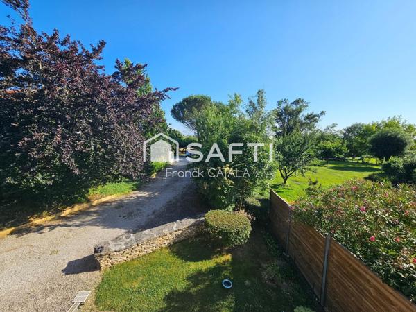 Du cachet pour cette maison à la campgne avec garage