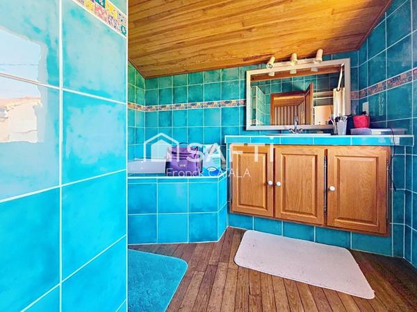 Du cachet pour cette maison à la campgne avec garage