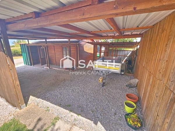 Du cachet pour cette maison à la campgne avec garage