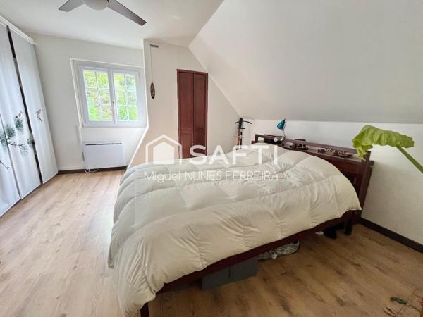 Maison avec sous-sol complet et vue dégagée