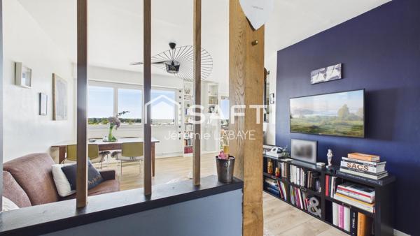 Bel appartement rénové avec balcon, cave et garage