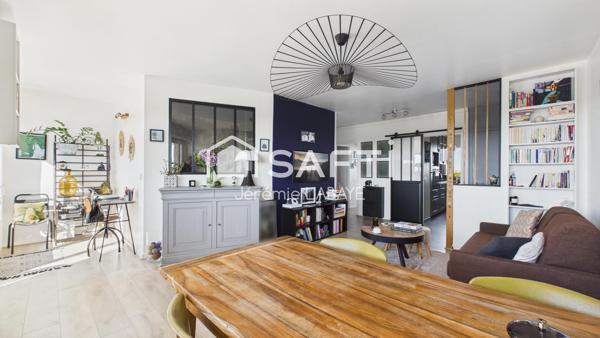 Bel appartement rénové avec balcon, cave et garage