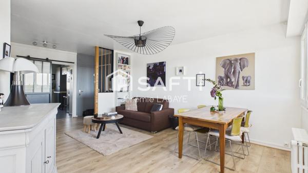 Bel appartement rénové avec balcon, cave et garage