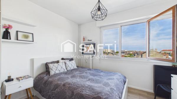 Bel appartement rénové avec balcon, cave et garage