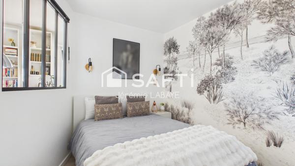 Bel appartement rénové avec balcon, cave et garage