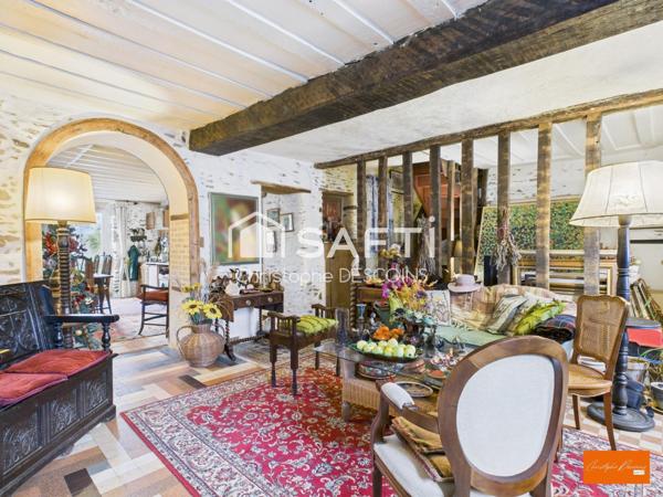 Maison de ville de charme en pierre avec jardin à Saint-Aignan-de-Couptrain