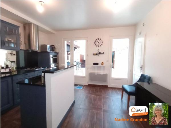 Maison de ville avec Patio, Garage et Local commercial