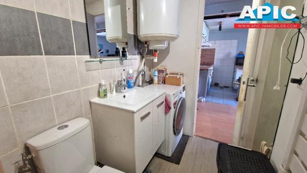 GROSLAY,

Dans une petite copropriété en plein centre ...