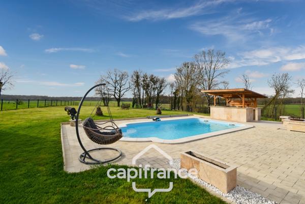 Propriété de charme proche Louhans (71500) – Authentique ferme bressane rénovée, 165 m², piscine, 4 chambres, terrain clos