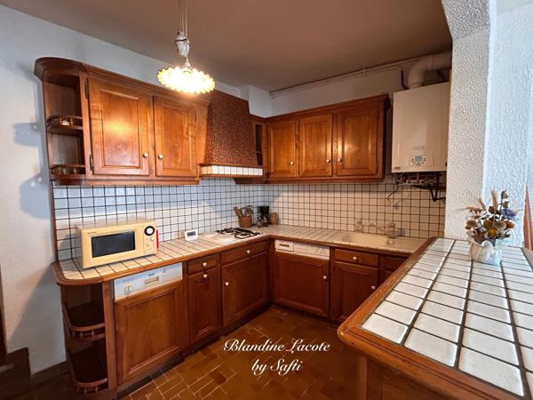 Maison en coeur de ville, sur les hauteurs