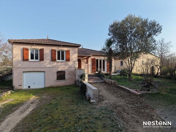 A Vendre Maison de 110 m² avec garage en sous-sol et jardin clôturé à Condom