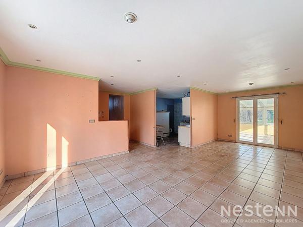 A Vendre Maison de 110 m² avec garage en sous-sol et jardin clôturé à Condom