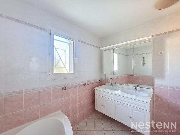 A Vendre Maison de 110 m² avec garage en sous-sol et jardin clôturé à Condom